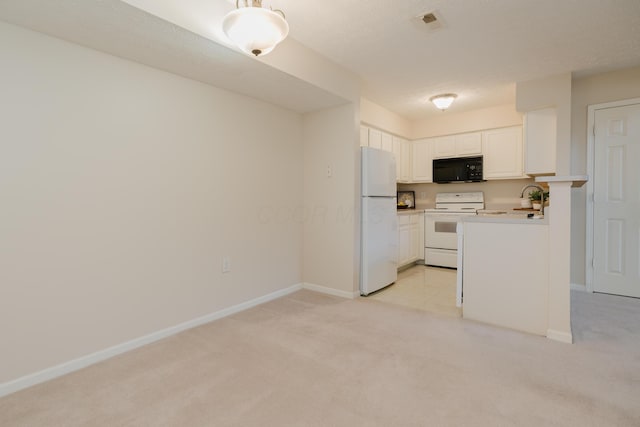 kitchen with light carpet, visible vents, white appliances, and baseboards