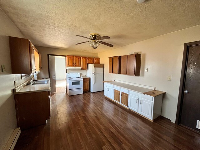 380 W Neff St, Morral, OH 43337 - kitchen featuring a sink, white appliances, baseboard heating, ceiling fan, and dark wood-style flooring