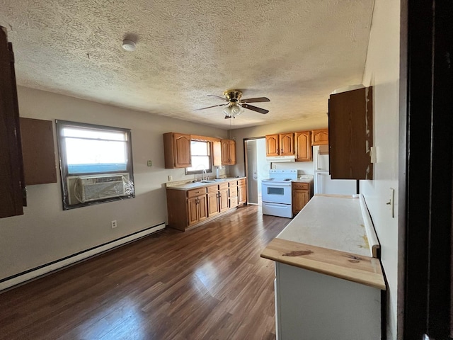 380 W Neff St, Morral, OH 43337 - kitchen with a ceiling fan, a sink, dark wood-style floors, white appliances, and a baseboard radiator