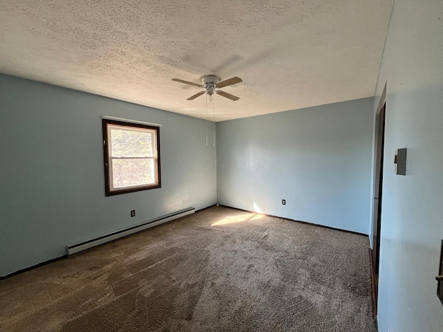 380 W Neff St, Morral, OH 43337 - carpeted spare room with a baseboard radiator, baseboards, a textured ceiling, and a ceiling fan