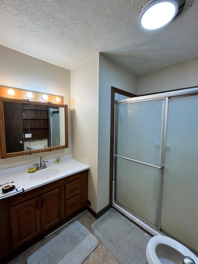 380 W Neff St, Morral, OH 43337 - bathroom with toilet, a stall shower, vanity, and a textured ceiling