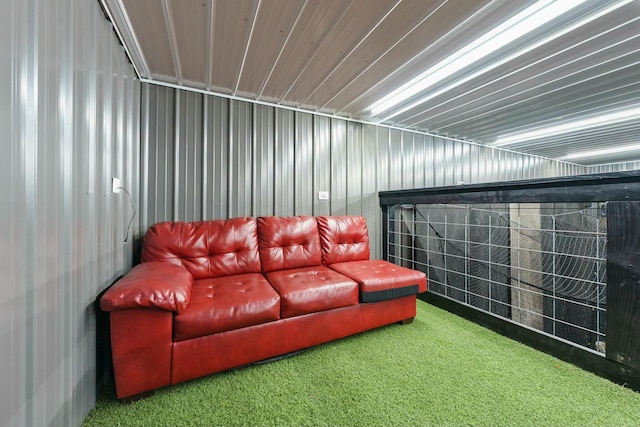 home theater room featuring metal wall