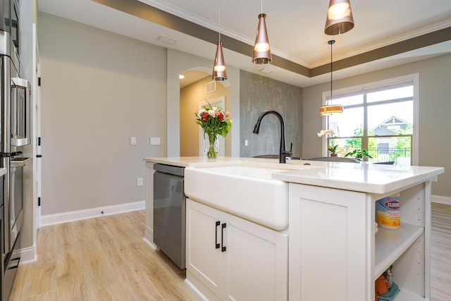 kitchen with ornamental molding, a sink, open shelves, stainless steel dishwasher, and white cabinets