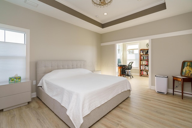 bedroom with baseboards, visible vents, recessed lighting, ornamental molding, and light wood-type flooring