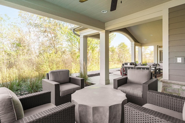 view of patio featuring an outdoor hangout area and ceiling fan