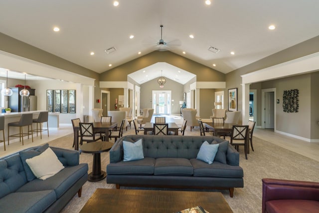 living area featuring visible vents, recessed lighting, baseboards, ceiling fan, and vaulted ceiling