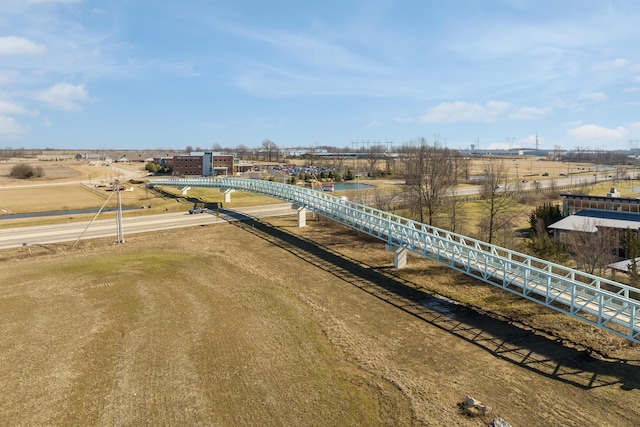 drone / aerial view featuring a pier