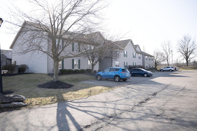 view of front of house featuring uncovered parking