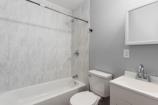 full bathroom with toilet, vanity, and bathtub / shower combination