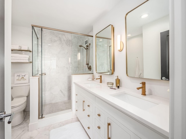 full bath featuring a sink, a marble finish shower, and toilet