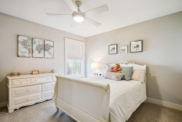 bedroom featuring carpet flooring, a ceiling fan, and baseboards