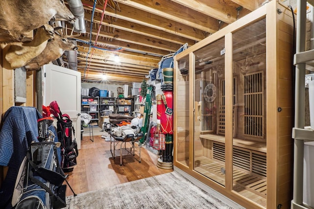 unfinished basement with wood finished floors