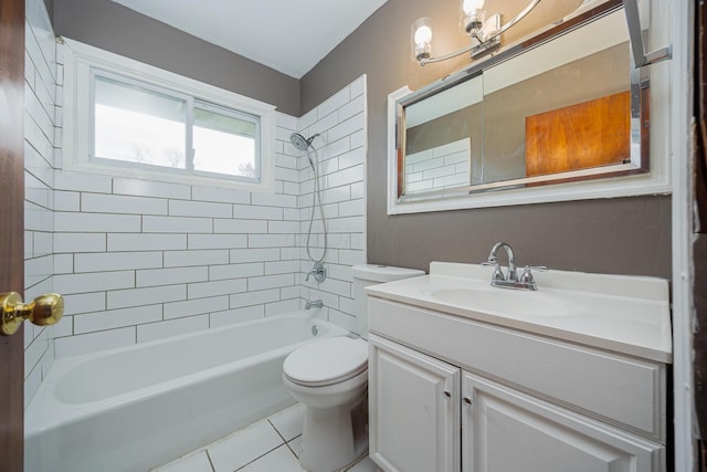 full bath featuring tile patterned floors, vanity, toilet, and bathing tub / shower combination