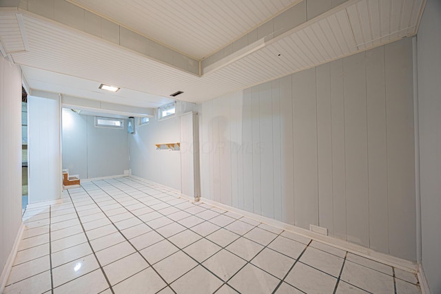 basement featuring tile patterned floors