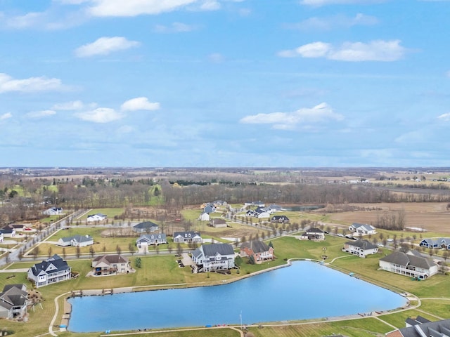 birds eye view of property featuring a residential view and a water view