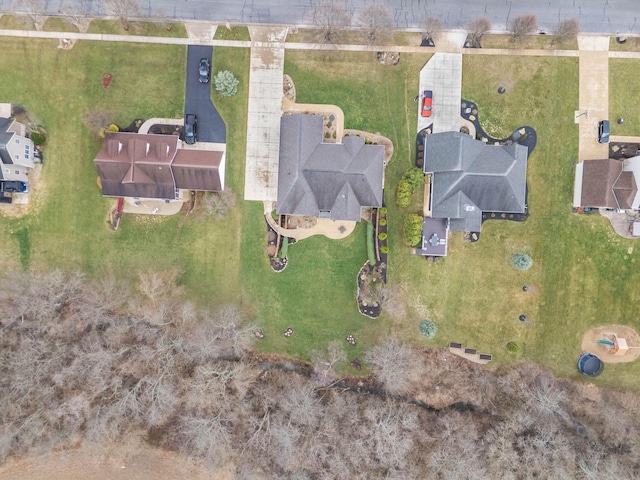 birds eye view of property with a residential view
