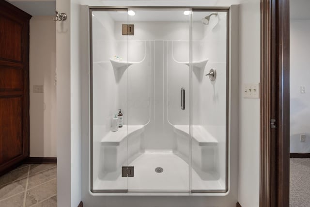 bathroom featuring a stall shower
