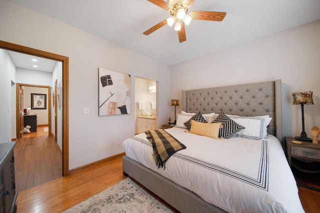 bedroom with baseboards, light wood-type flooring, recessed lighting, ensuite bath, and a ceiling fan