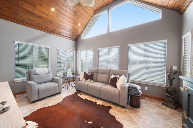 living room with wooden ceiling, baseboards, tile patterned floors, and high vaulted ceiling