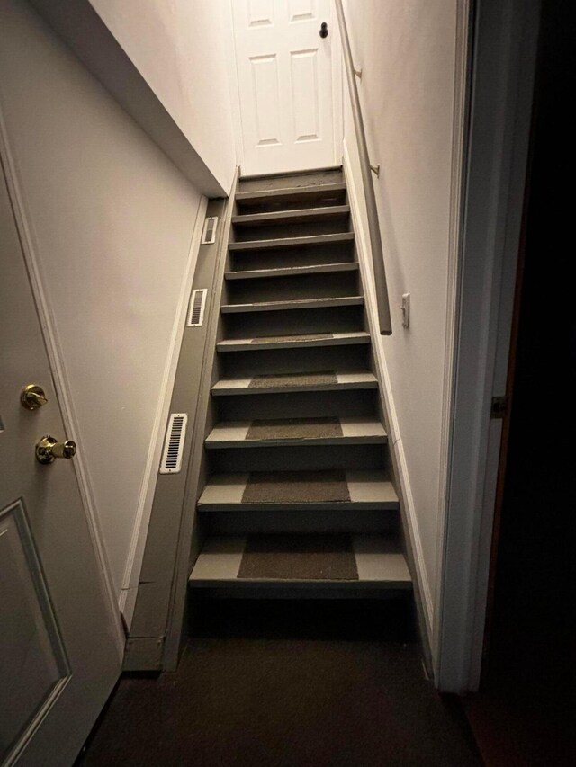 staircase with visible vents