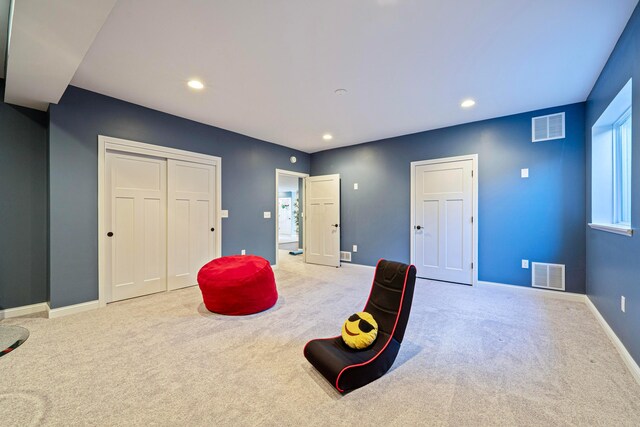 interior space with recessed lighting, carpet flooring, baseboards, and visible vents