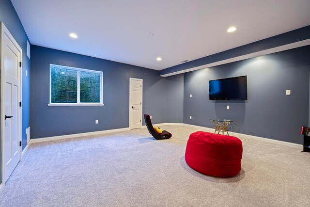 interior space featuring recessed lighting, baseboards, and carpet floors