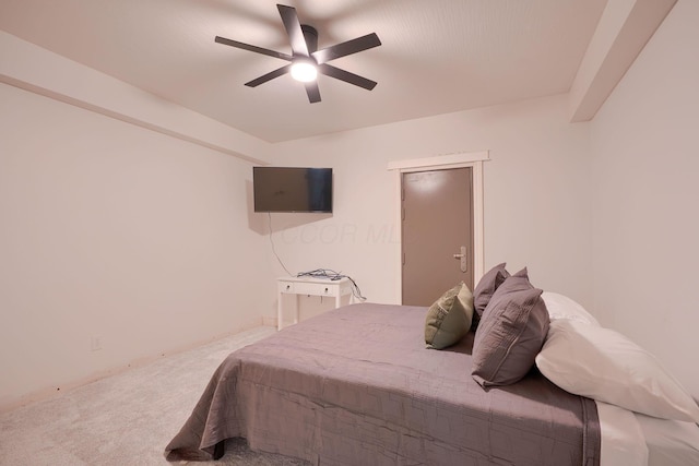 carpeted bedroom featuring a ceiling fan