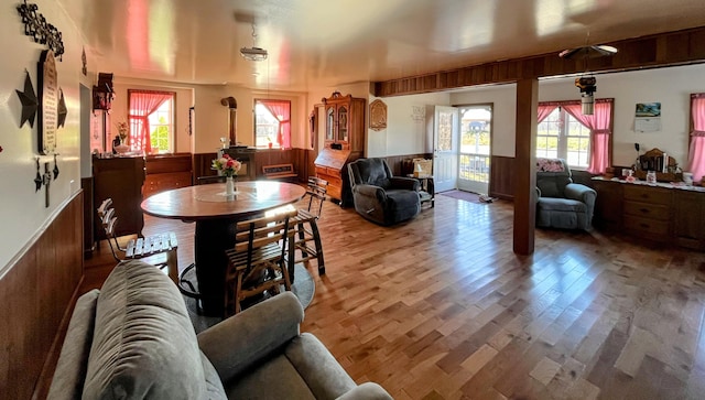 living room featuring wood finished floors and wainscoting