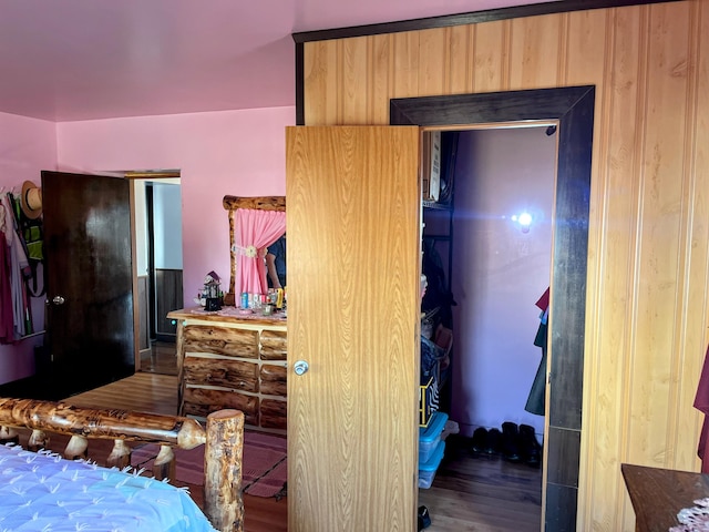 bedroom featuring wood finished floors