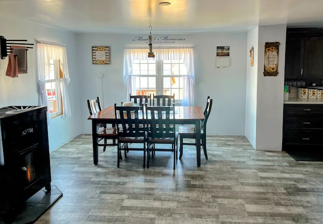 dining area featuring light wood finished floors