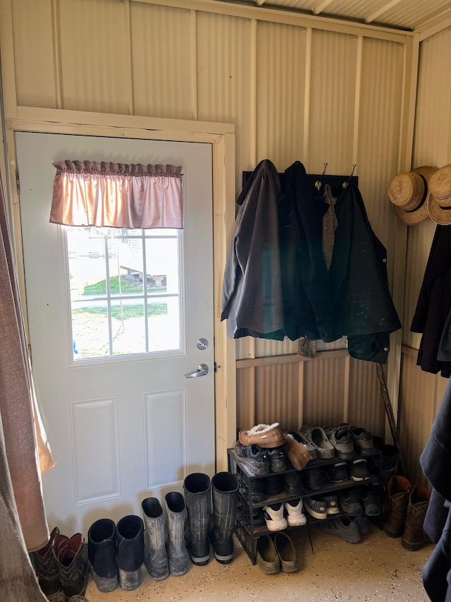 doorway to outside with speckled floor