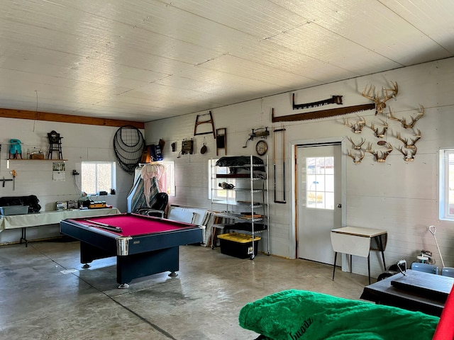 playroom featuring finished concrete flooring and billiards