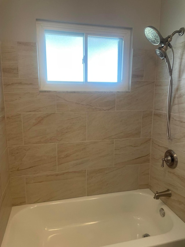 bathroom featuring bathtub / shower combination