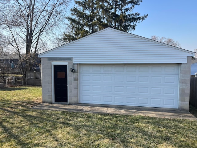 garage with fence