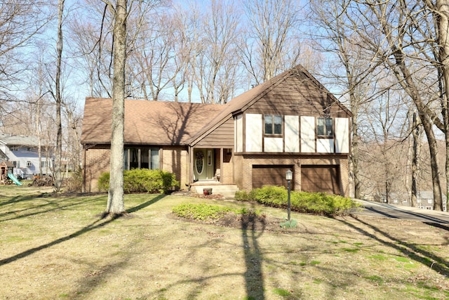 view of front of home with brick siding, a shingled roof, a playground, a front yard, and an attached garage