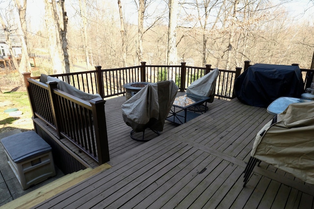 wooden deck with grilling area