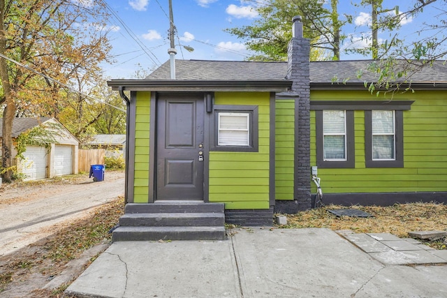 exterior space with entry steps and an outdoor structure