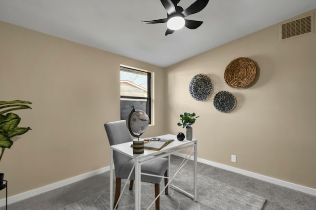 carpeted home office with visible vents, baseboards, and a ceiling fan