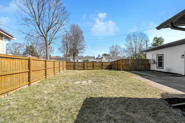 view of yard featuring a fenced backyard