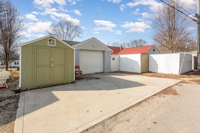 garage featuring fence