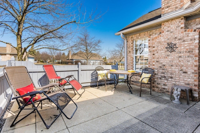 view of patio / terrace with fence