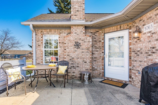 view of patio / terrace with outdoor dining space and a grill