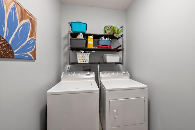 laundry room featuring laundry area and washer and dryer