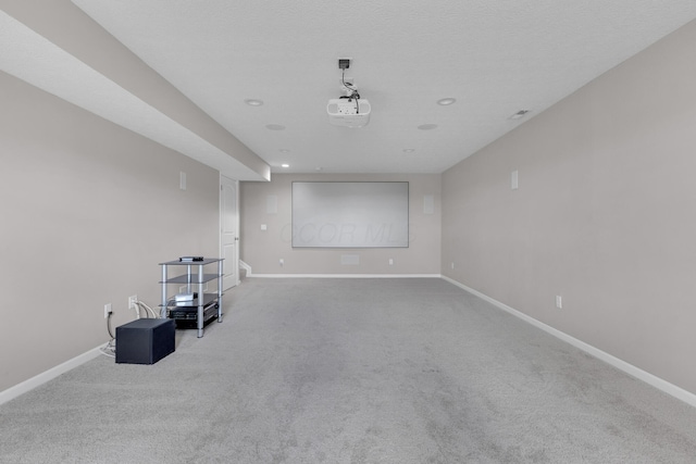 interior space with baseboards and carpet flooring