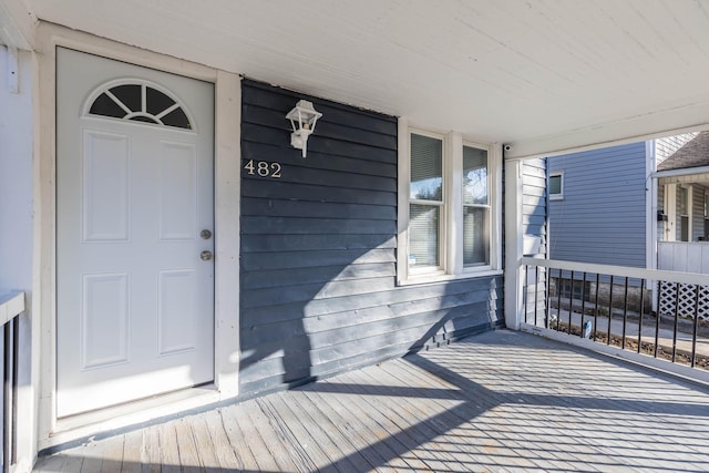 entrance to property with covered porch