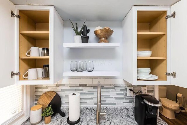 room details featuring built in shelves and open shelves