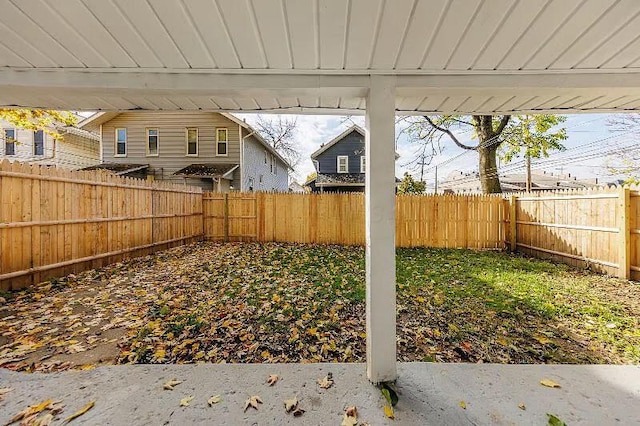 view of yard with a fenced backyard