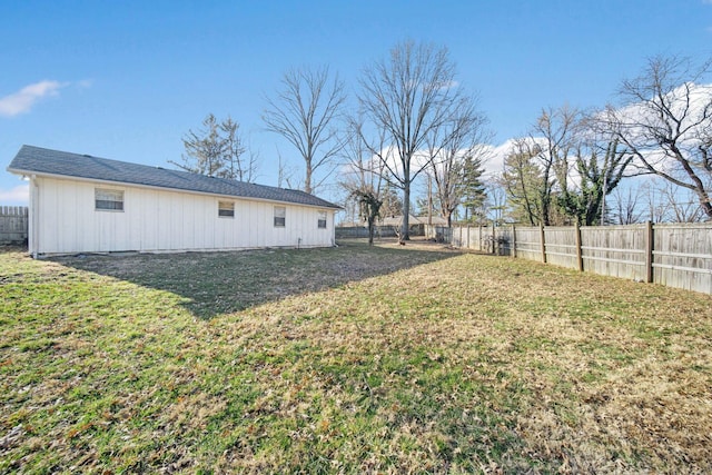 view of yard with a fenced backyard