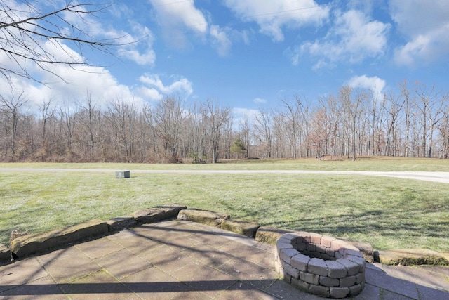 exterior space with a fire pit