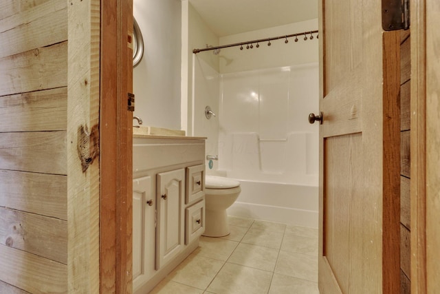 full bathroom with vanity, tile patterned floors, toilet, and shower / bath combination